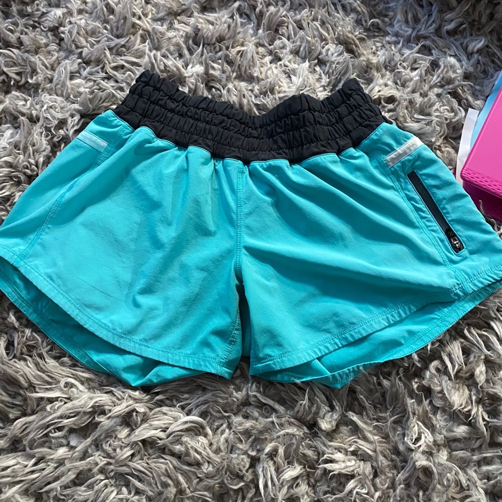 Teal Lululemon wet.dry.warm running shorts